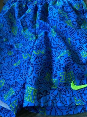 Nike Blue Shorts with Neon Green Doodle Print and Columbia shirt